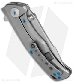 Reate Knives New Torrent Frame Lock Knife Bead Blast Titanium (3.6" Satin/SW) 8 Reate Knives New Torrent Frame Lock Knife Bead Blast Titanium (3.6" Satin/SW) -Reate Knives Reate Knives New Torrent FL BB Ti Satin SW BHQ 83615 jr side